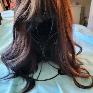 Long wavy brunette wig. Never worn, just tried on.